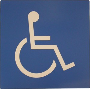 Wheelchair accessibility symbol on blue sign