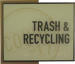 Trash and recycling sign with braille