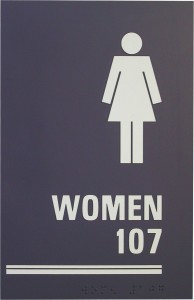 Women restroom sign labeled 107