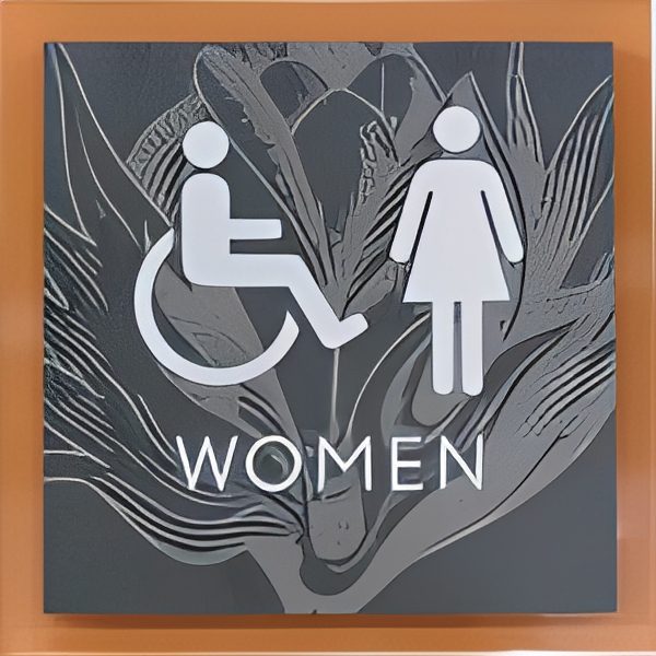Women's restroom sign with accessibility symbol