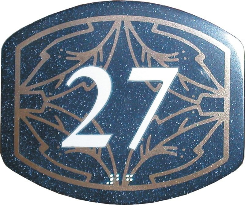 Number 27 on decorative plaque