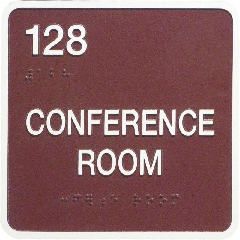 Braille conference room 128 sign